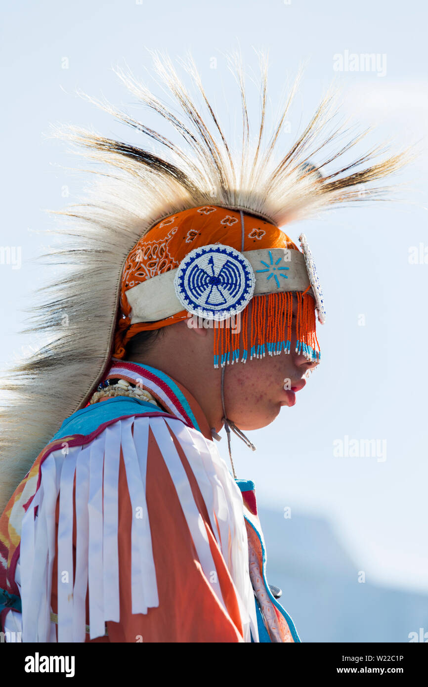 First Nations male person participating at a Pow Wow as a dancer Stock Photo