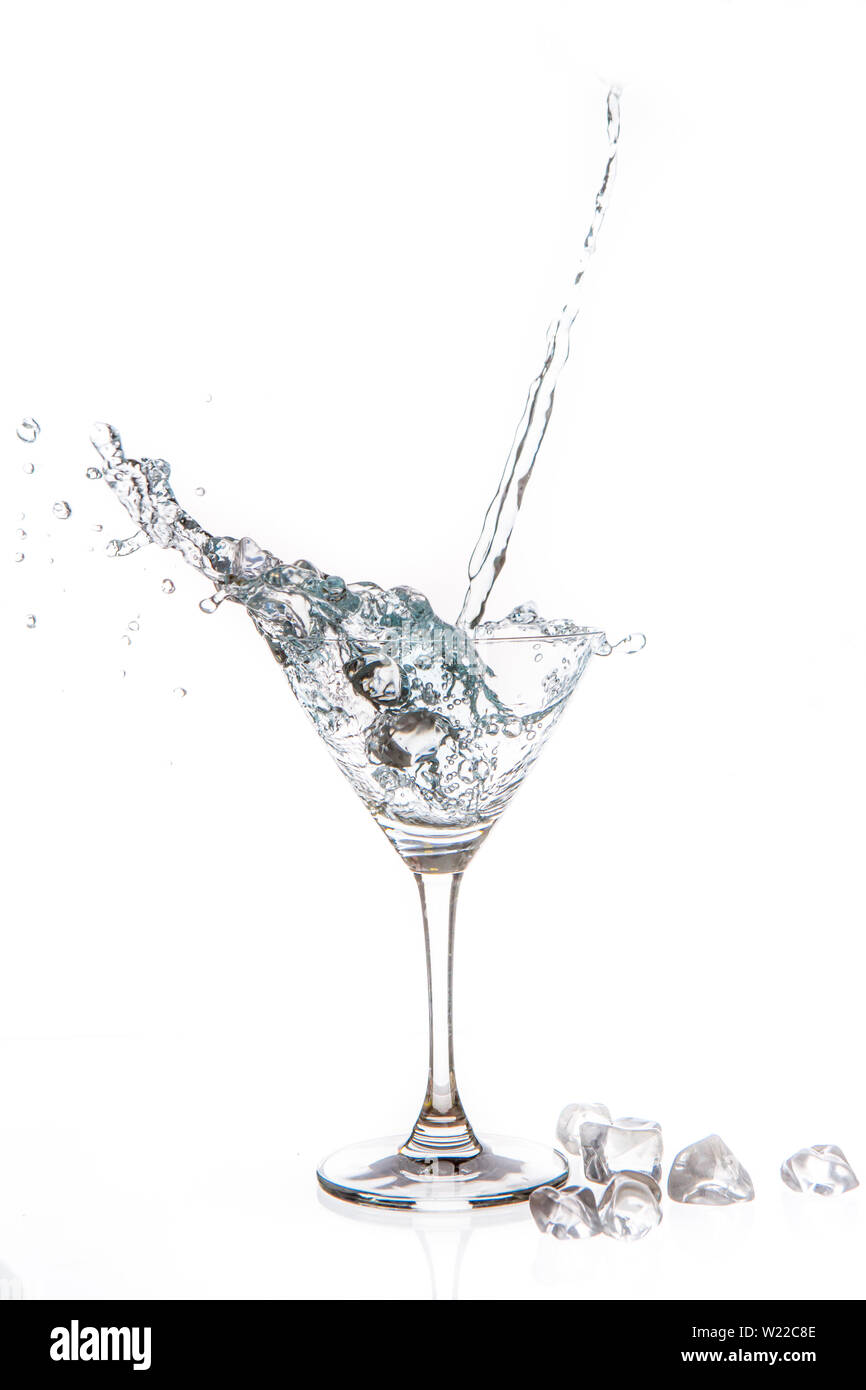 Glass of water and ice on a white background Stock Photo Alamy