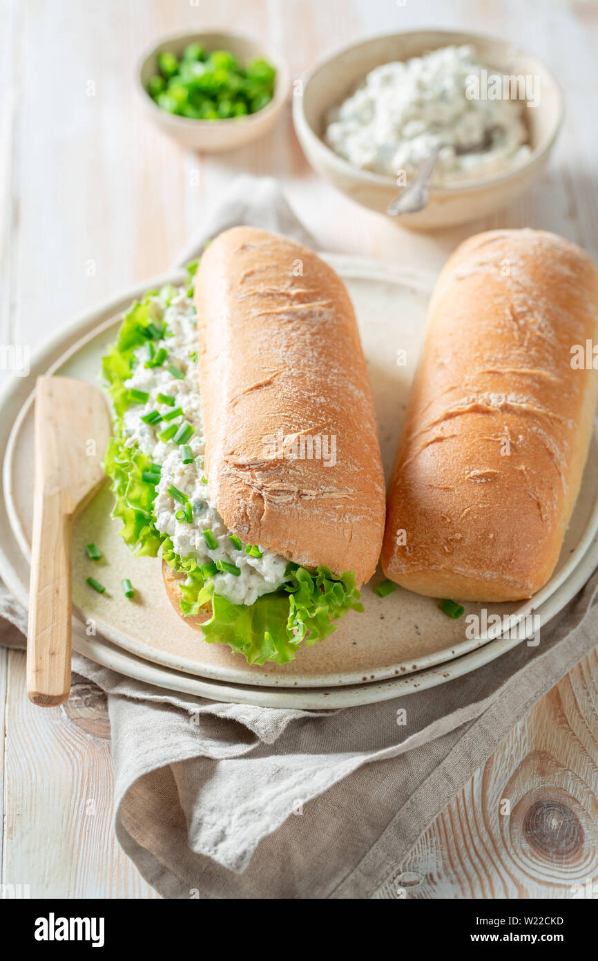 Tasty sandwich with fromage cheese, crunchy bread and lettuce Stock ...