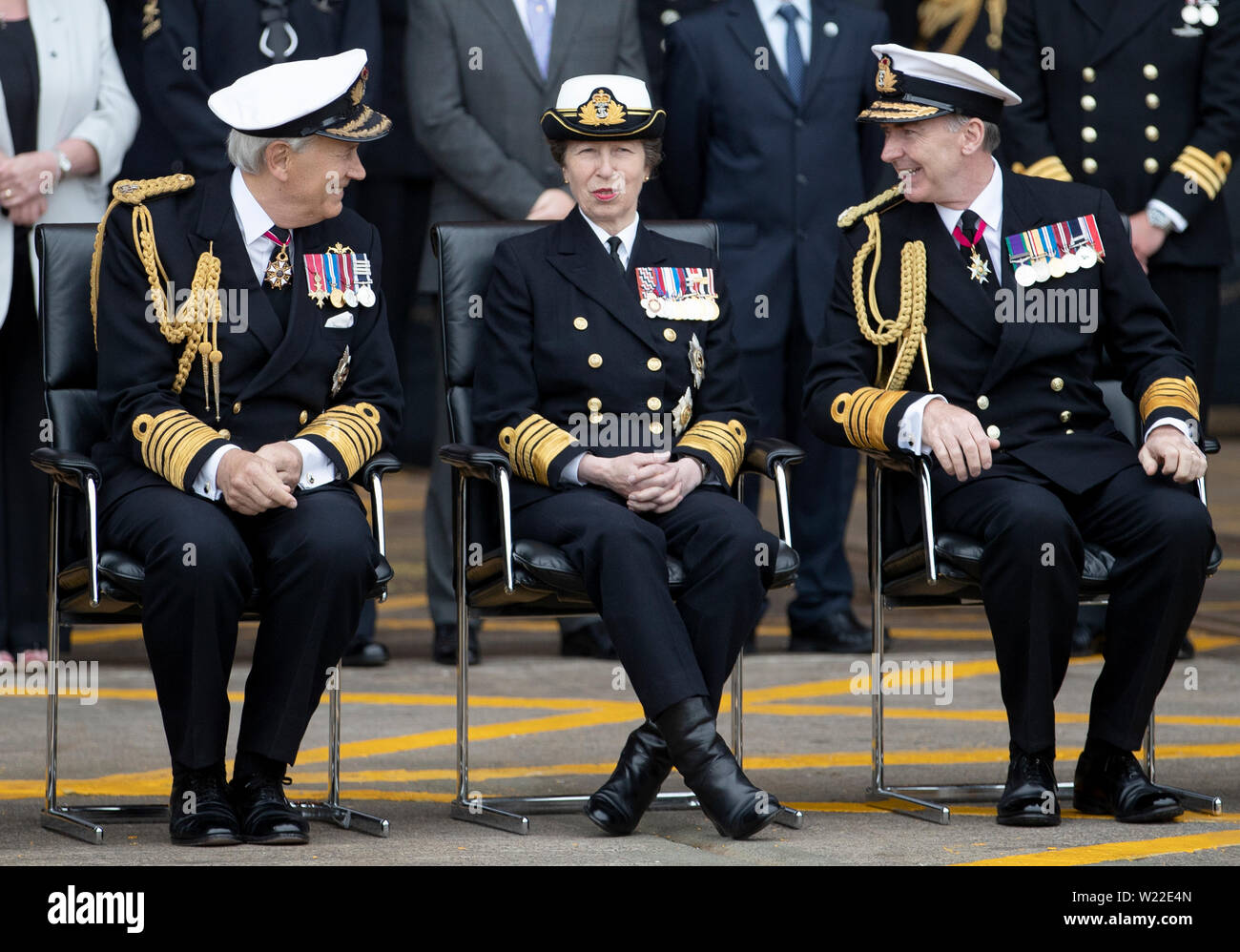 The Princess Royal with Lord Michael Cecil Boyce (left) and First Sea Lord Tony Radakin (right) during the parade with serving Royal Navy submariners, veterans, families and support workers gather at HM Naval Base Clyde, the home of the UK Submarine Service at Faslane in Argyll and Bute, to mark 50 years of the Continuous At Sea Deterrent (CASD). Stock Photo