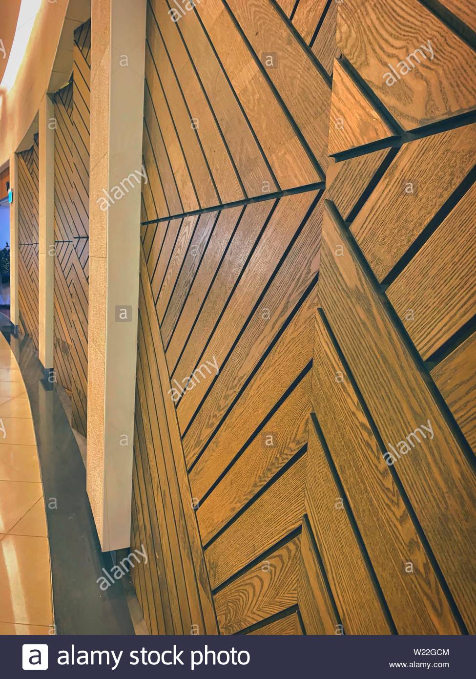 An Artistic Wall With Boards Going In Different Directions