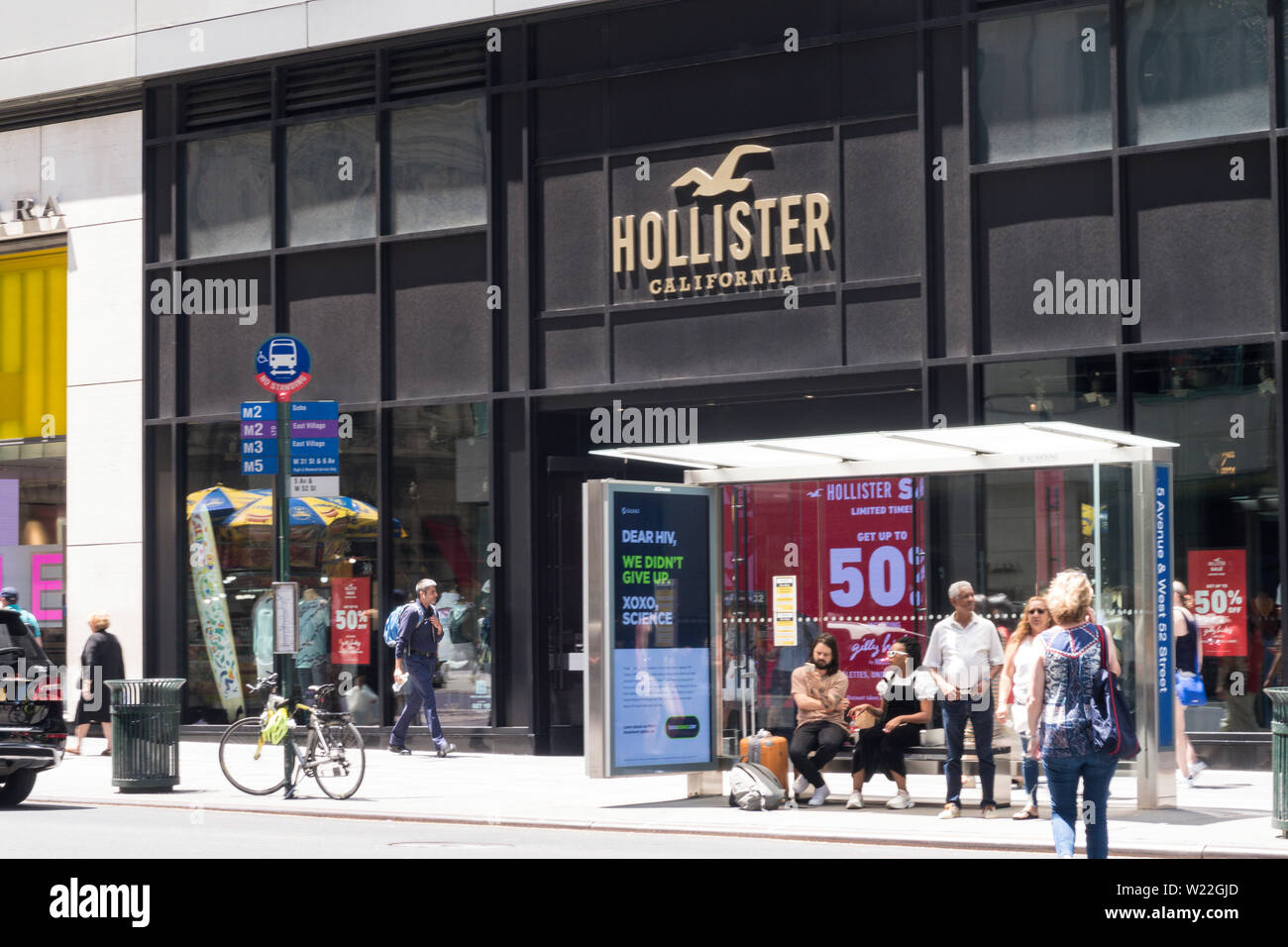 Crowds Outside the Hollister California Store on Fifth Avenue, NYC, USA Stock Photo