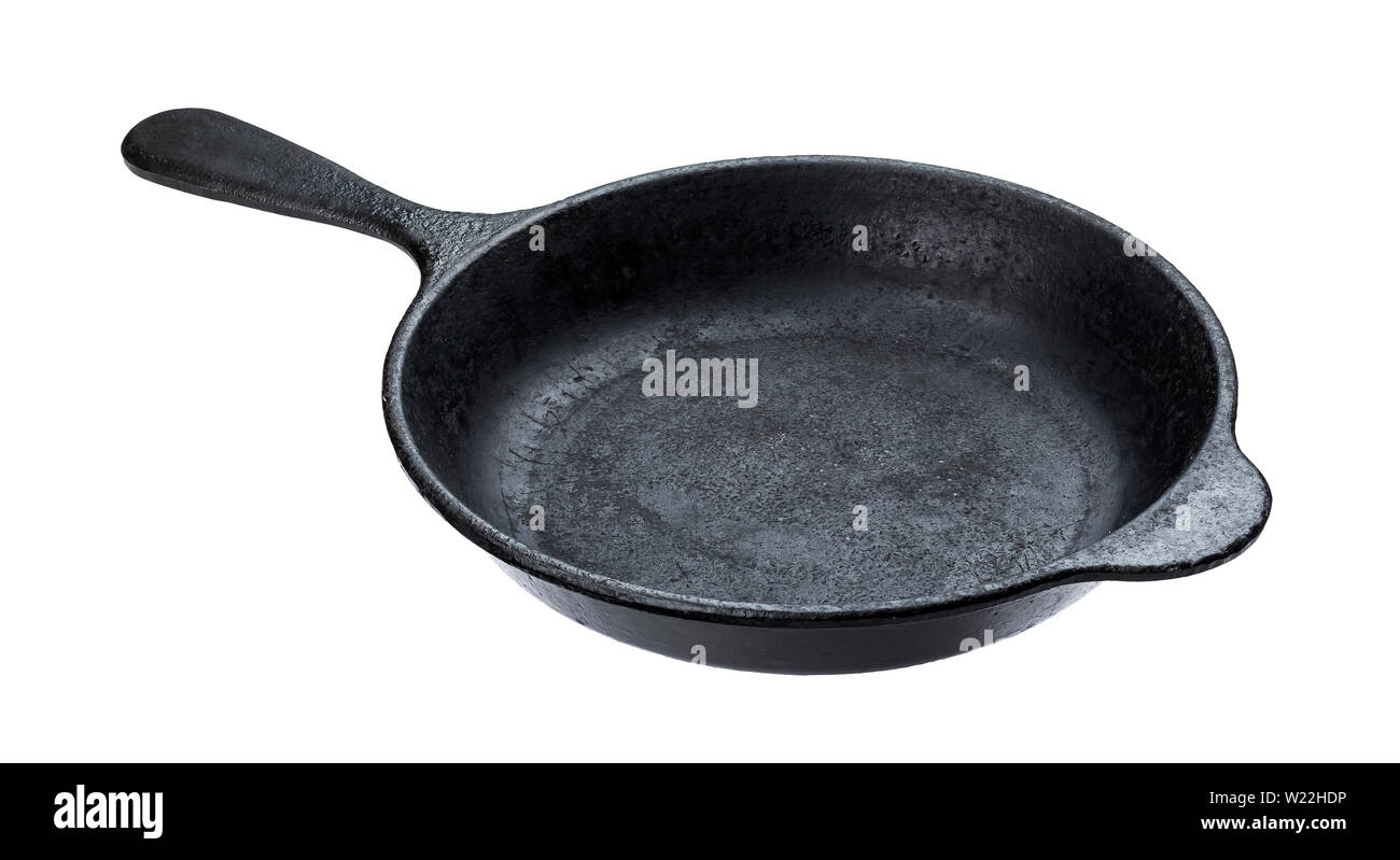 Old cast iron pan isolated on white background with clipping path Stock Photo