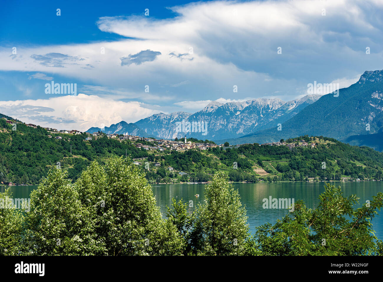 Caldonazzo lake (Lago di Caldonazzo) with the Alps and small village of Tenna, Valsugana valley, Trento province, Trentino Alto Adige, Italy, Europe Stock Photo