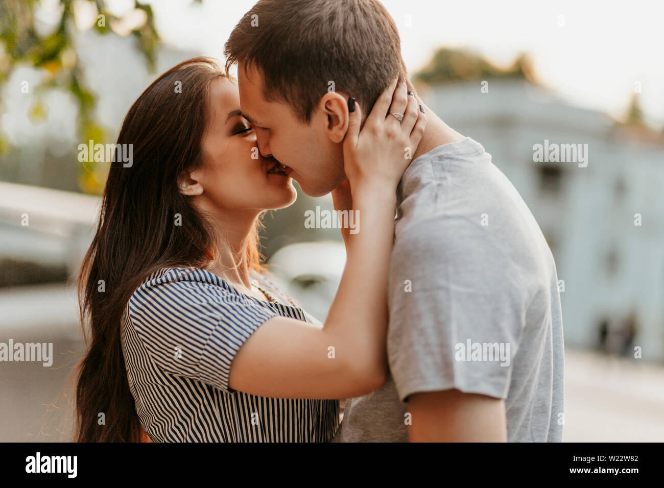 Happy young couple in love teenagers friends dressed in casual ...