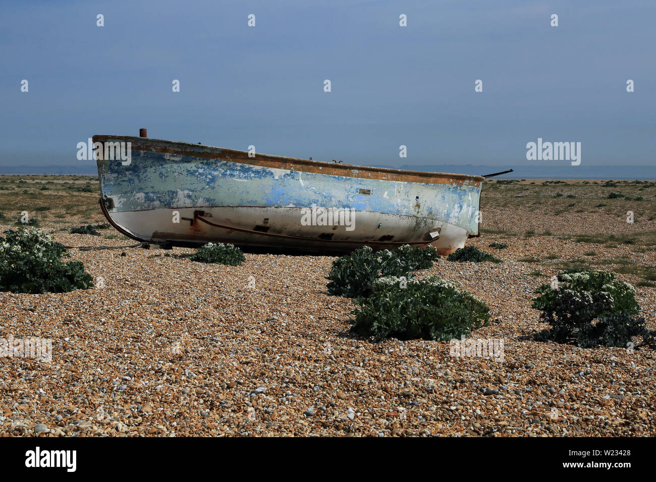 Abandoned fishing boat on shingle beach at Dungeness Road, Dungeness ...