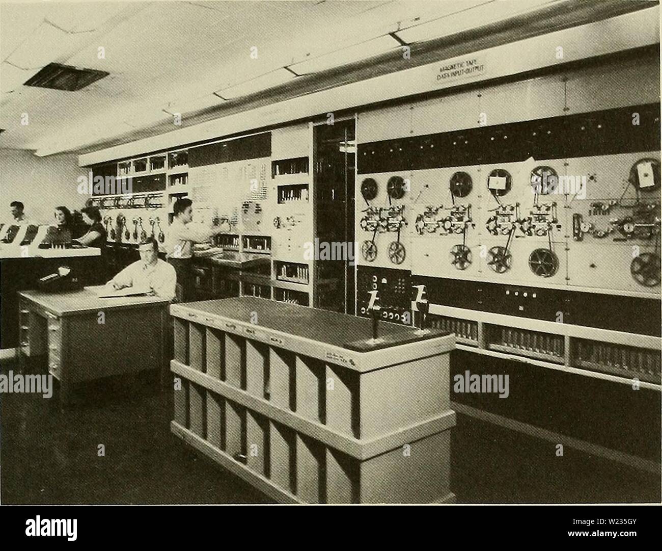 Archive image from page 136 of Dahlgren (1977). Dahlgren dahlgren00mcco Year: 1977 Development of Computer Technology 127 MARK III Aiken Dahlgren Electronic Calculator. felt that technology was moving along rapidly, and we felt that in order to get the best computer for our needs the Navy had to sponsor development. Around 1958, there was a committee put together to look at Navy needs, and they surveyed a lot of installations. They came to the conclusion that we should talk to some computer manufacturers like IBM, UNIVAC, and maybe Bur- roughs. They came to the conclusion that the way to Stock Photo