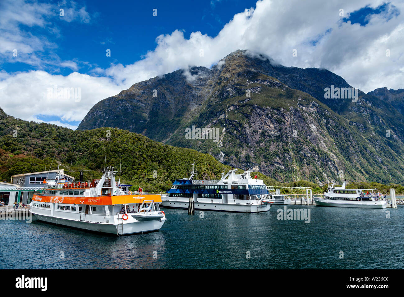 Milford Sound Cruise Boats, Fiordland National Park, South Island, New Zealand Stock Photo