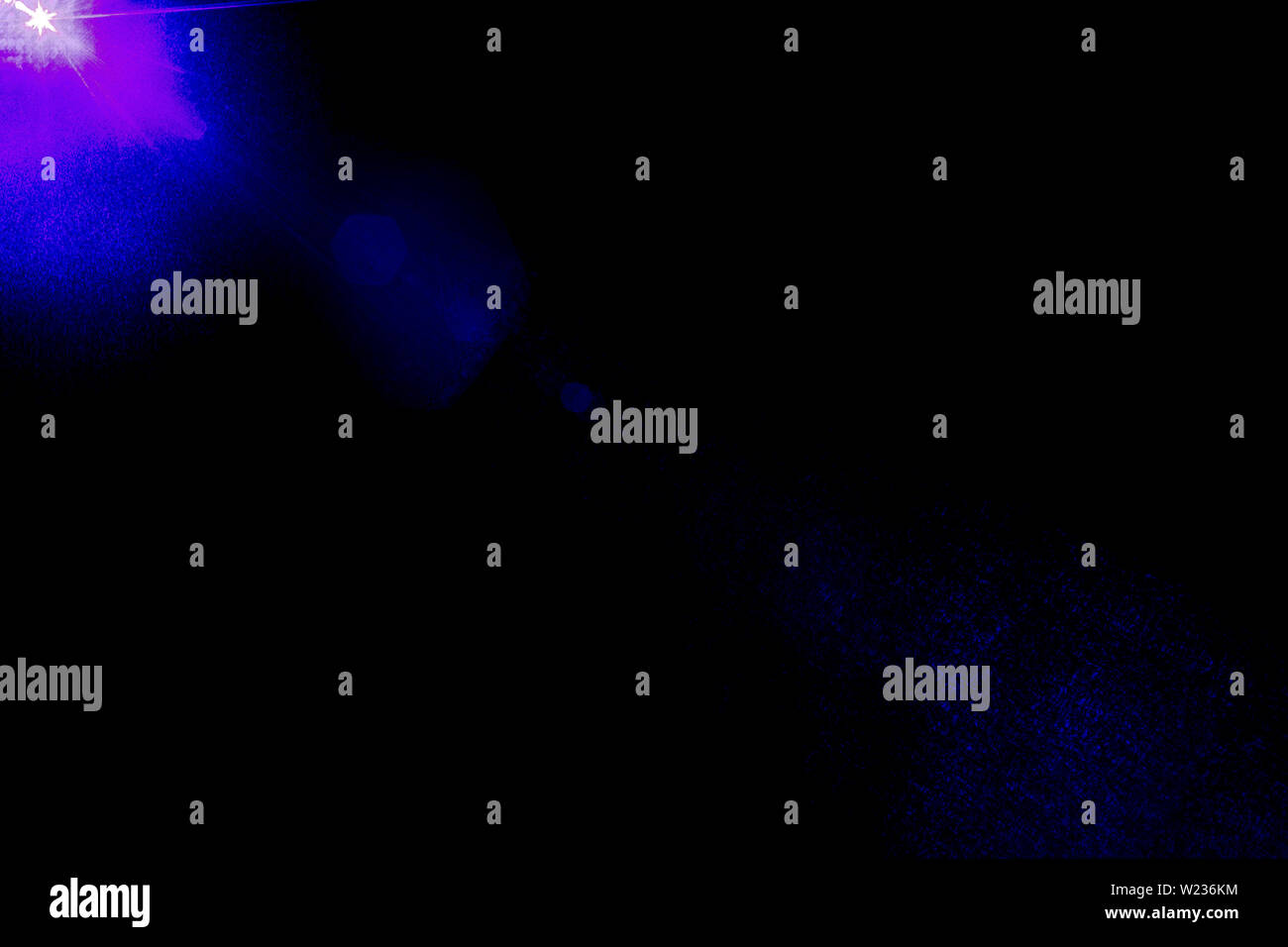 Camera lens flare by laser light create circles of objective and