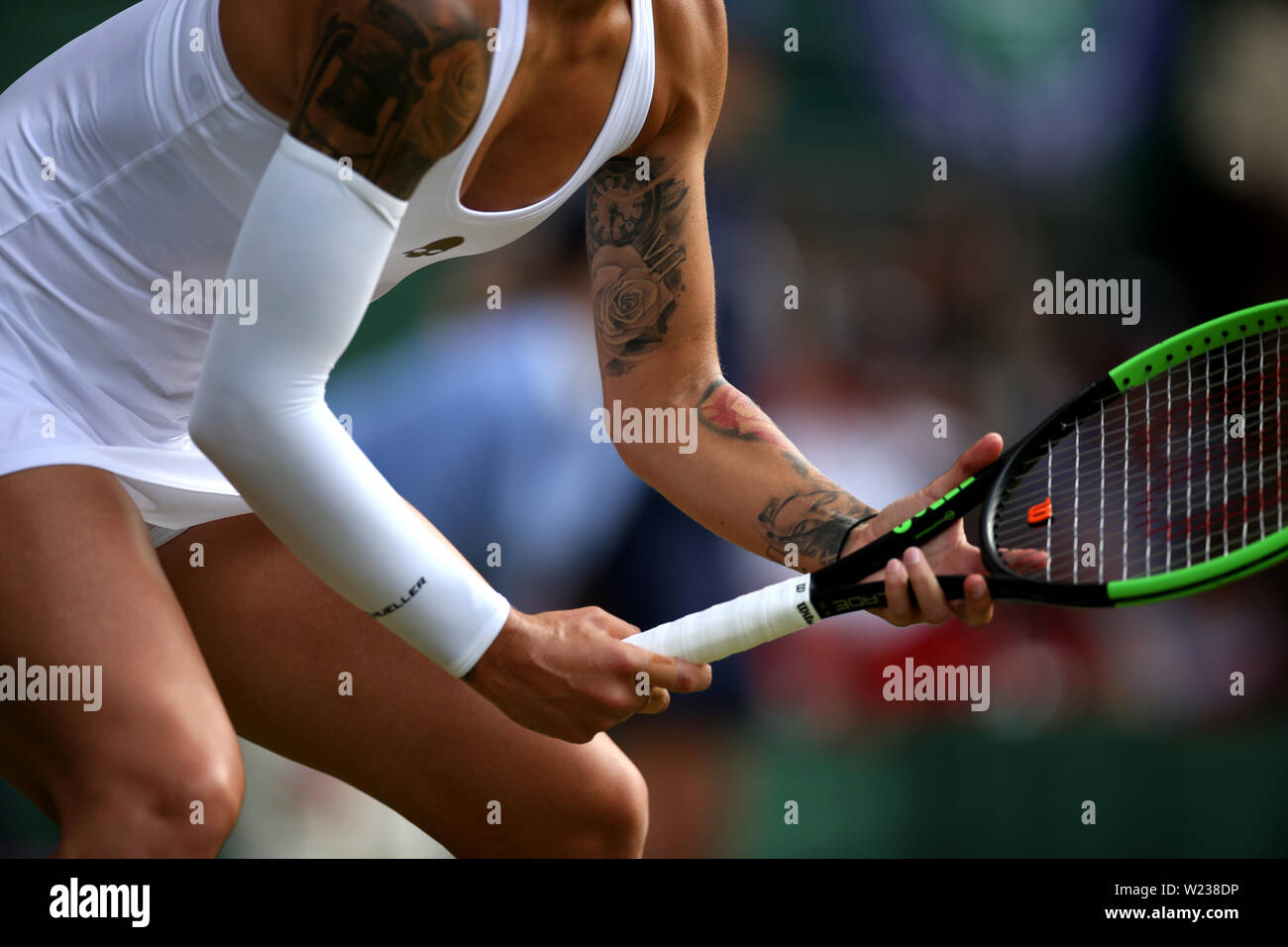 Tattoos On The Upper Body Of Polona Hercog As She Plays Against Cori Gauff On Day Five Of The Wimbledon Championships At The All England Lawn Tennis And Croquet Club Wimbledon Stock