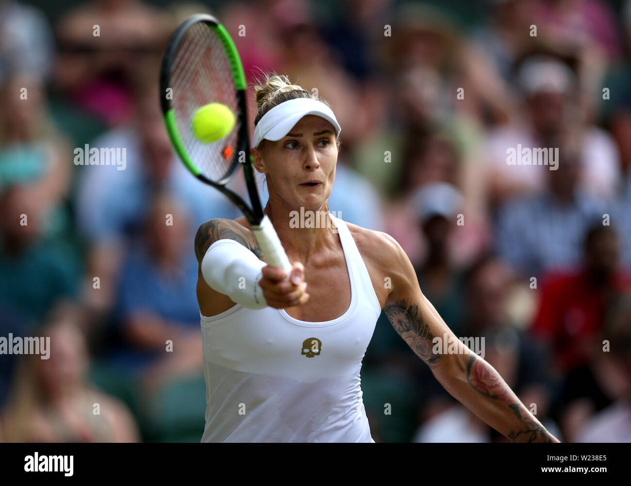 Tattoos on the upper body of Polona Hercog as she plays against Cori Gauff  on day five of the Wimbledon Championships at the All England Lawn Tennis  and Croquet Club, Wimbledon Stock