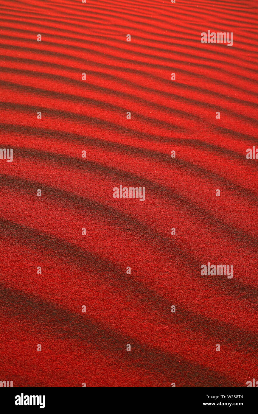 Vertical image of pop art styled desert sand ripple patterns for ...