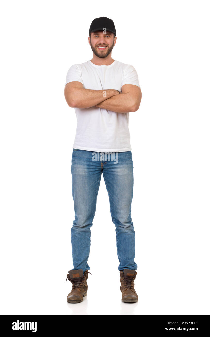 Man crossed arms legs Cut Out Stock Images & Pictures - Alamy
