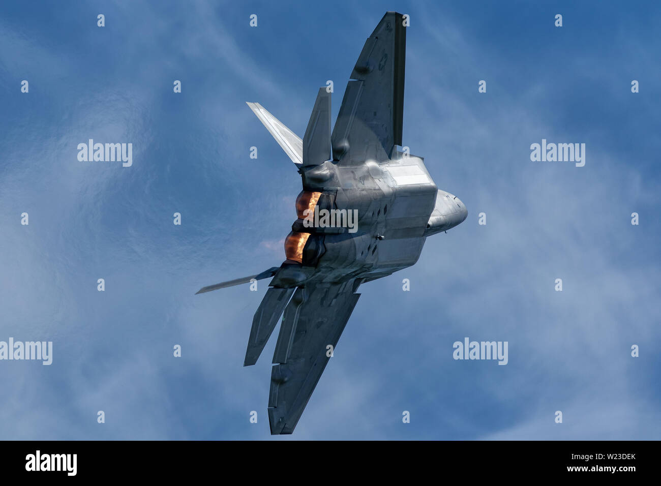F-22 Ariel demonstrations March 31, 2019 at Travis AFB exhibiting high performance and extreme maneuverability for air to air superiority. Stock Photo