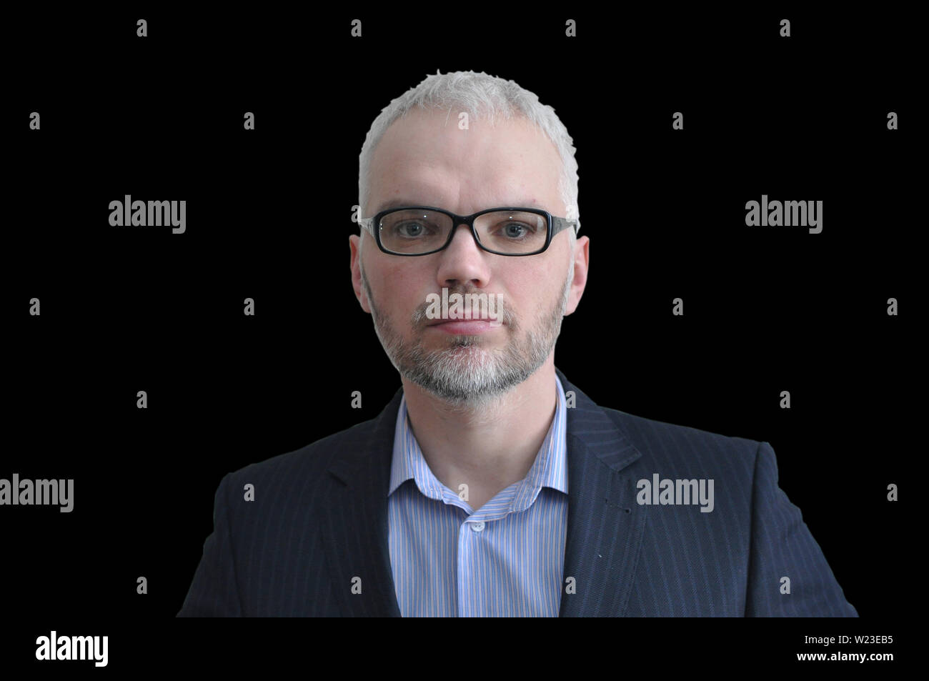 Handsome young man in shirt expresses various emotions. isolate on black background Stock Photo