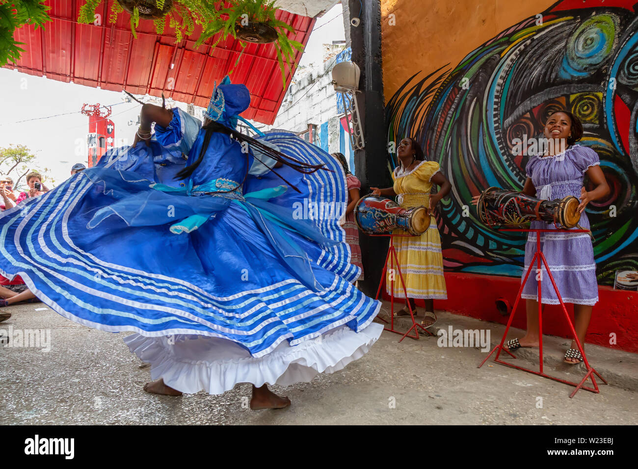 Havana, Cuba - May 29, 2019: Cuban people are performing an African Dance in the Old Havana City, Capital of Cuba, during a bright and sunny day. Stock Photo