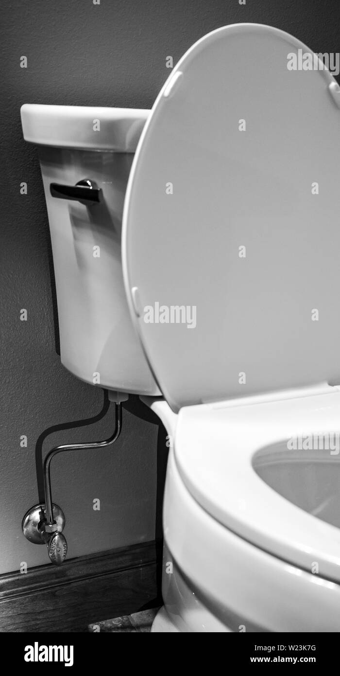 residential toilet water shutoff valve Stock Photo Alamy