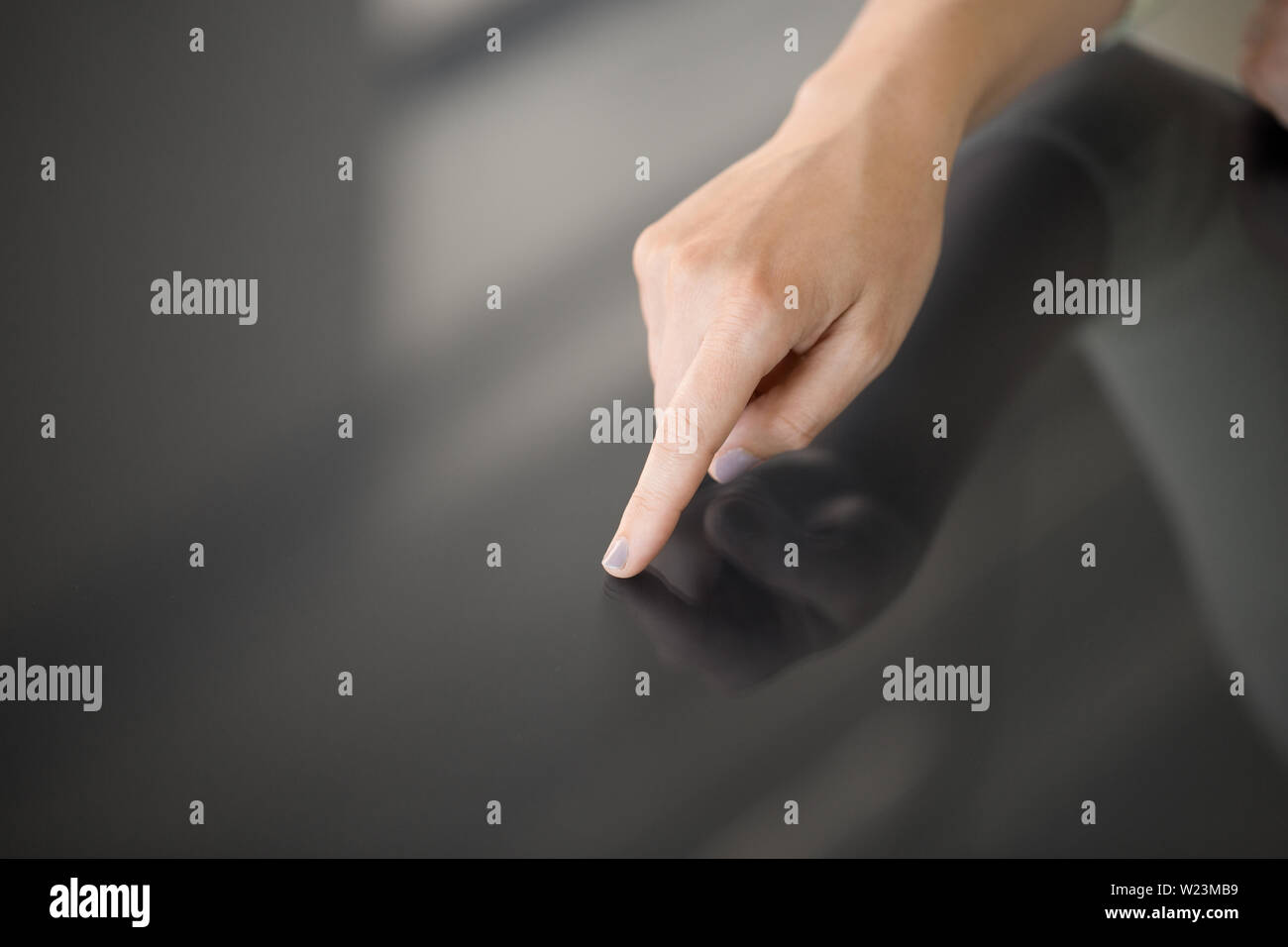 hand using black interactive panel Stock Photo