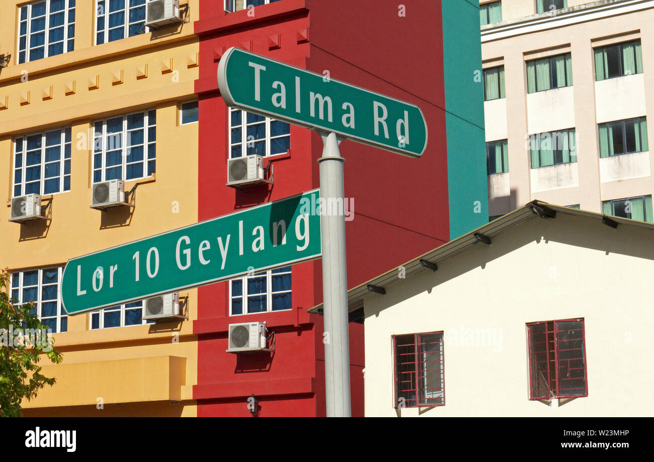 singapore, singapore - november 29, 2009: view onto facades of buildings in geylang and street sign Stock Photo