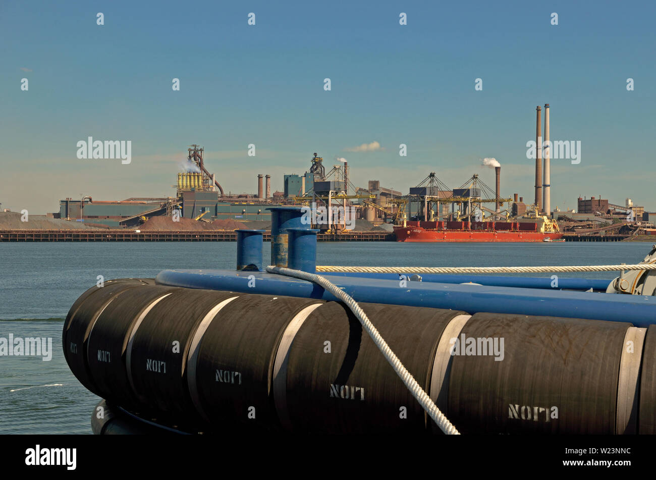ijmuiden, noord holland/netherlands - august 05, 2013: a bulkcarrier discharging at tata steel steelworks / steelmil Stock Photo