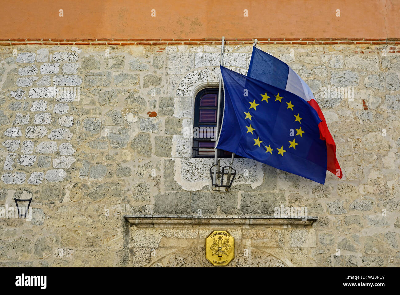 santo domingo, dominican republic - february 25, 2014: the european union and the french flag above the entrance of the french embassy on calle las da Stock Photo