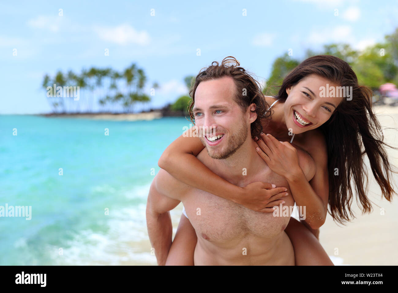 Healthy happy couple beach body bikini hi-res stock photography and images  - Alamy