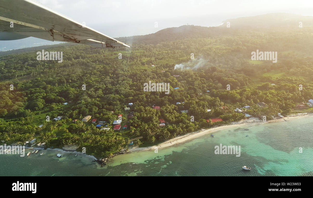 Corn island from airplane  window on sunny day Stock Photo