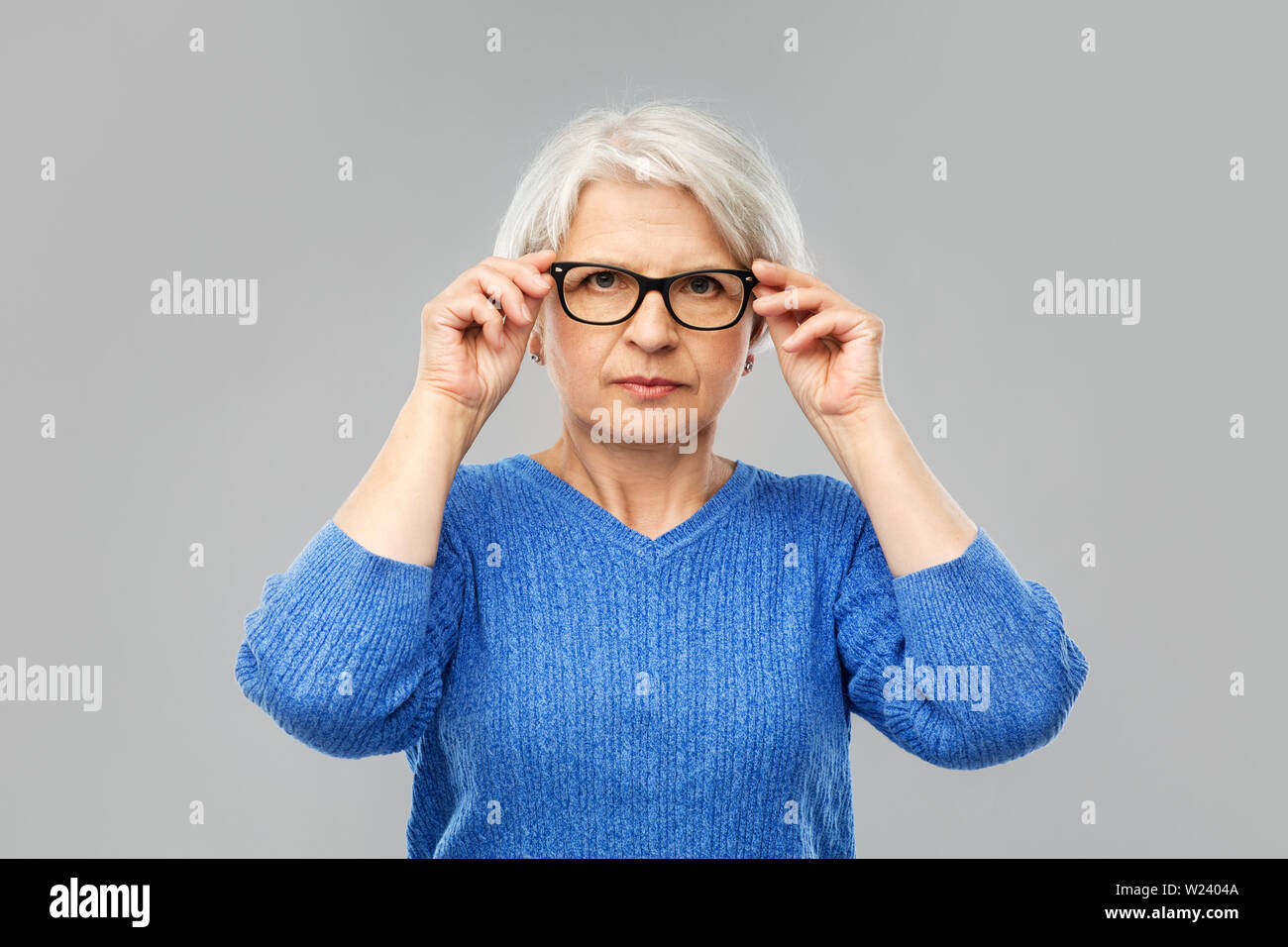 Woman short gray hair with glasses hi-res stock photography and images ...