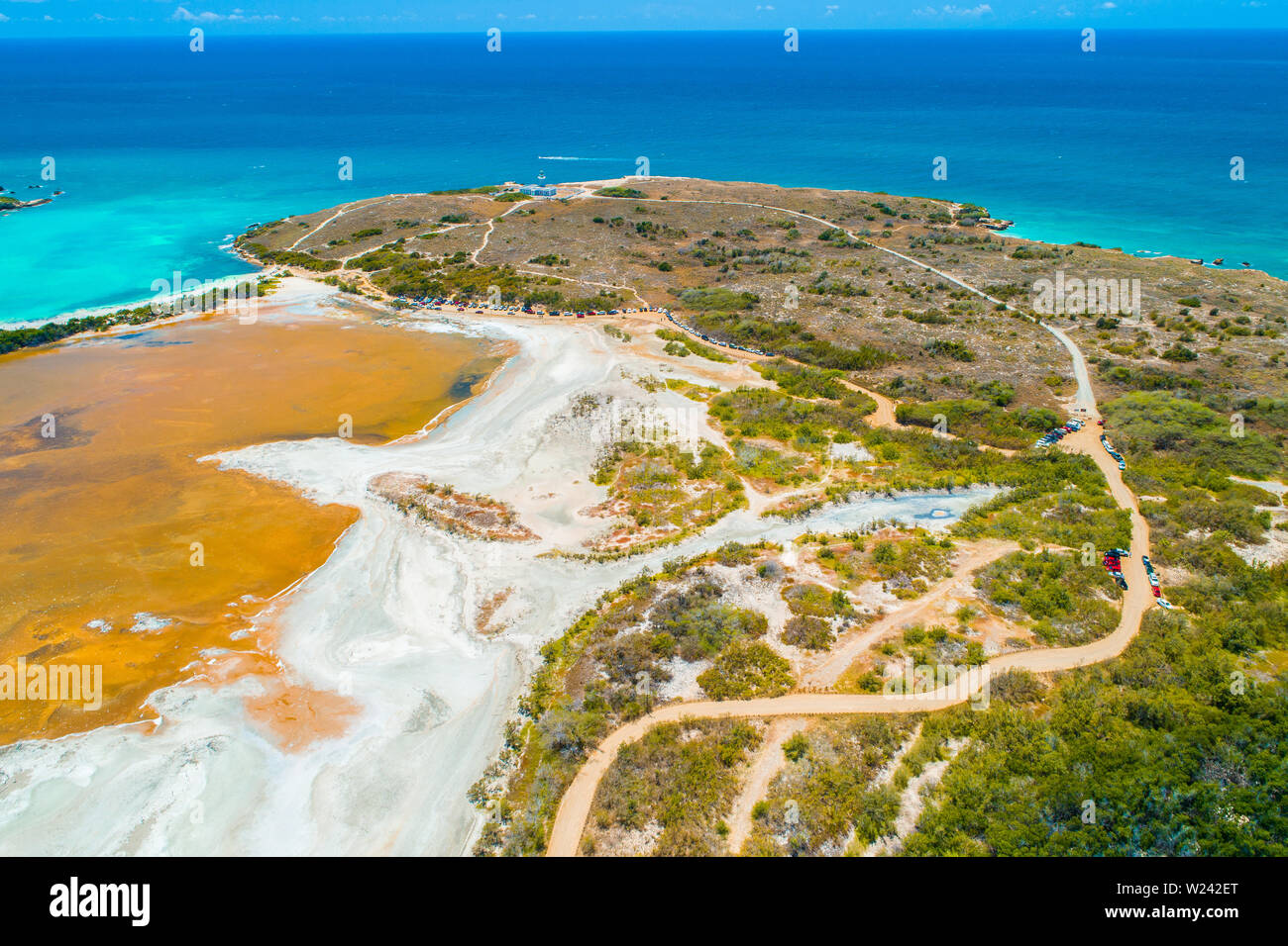 Aerial view of Puerto Rico. Faro Los Morrillos de Cabo Rojo. Playa Sucia beach and Salt lakes in Punta Jaguey. Stock Photo