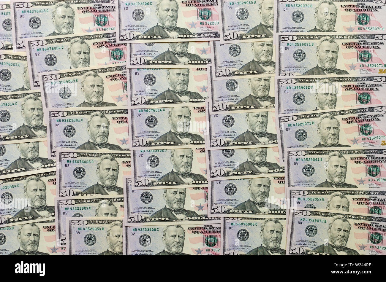 Multiple pattern or background made of 50 dollar bills. Stock Photo