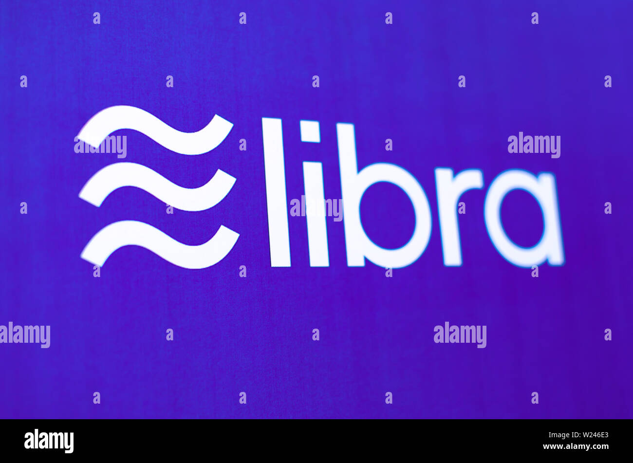 Facebook Libra logo on a printed brochure. Close up photos with shallow depth of field. Stock Photo