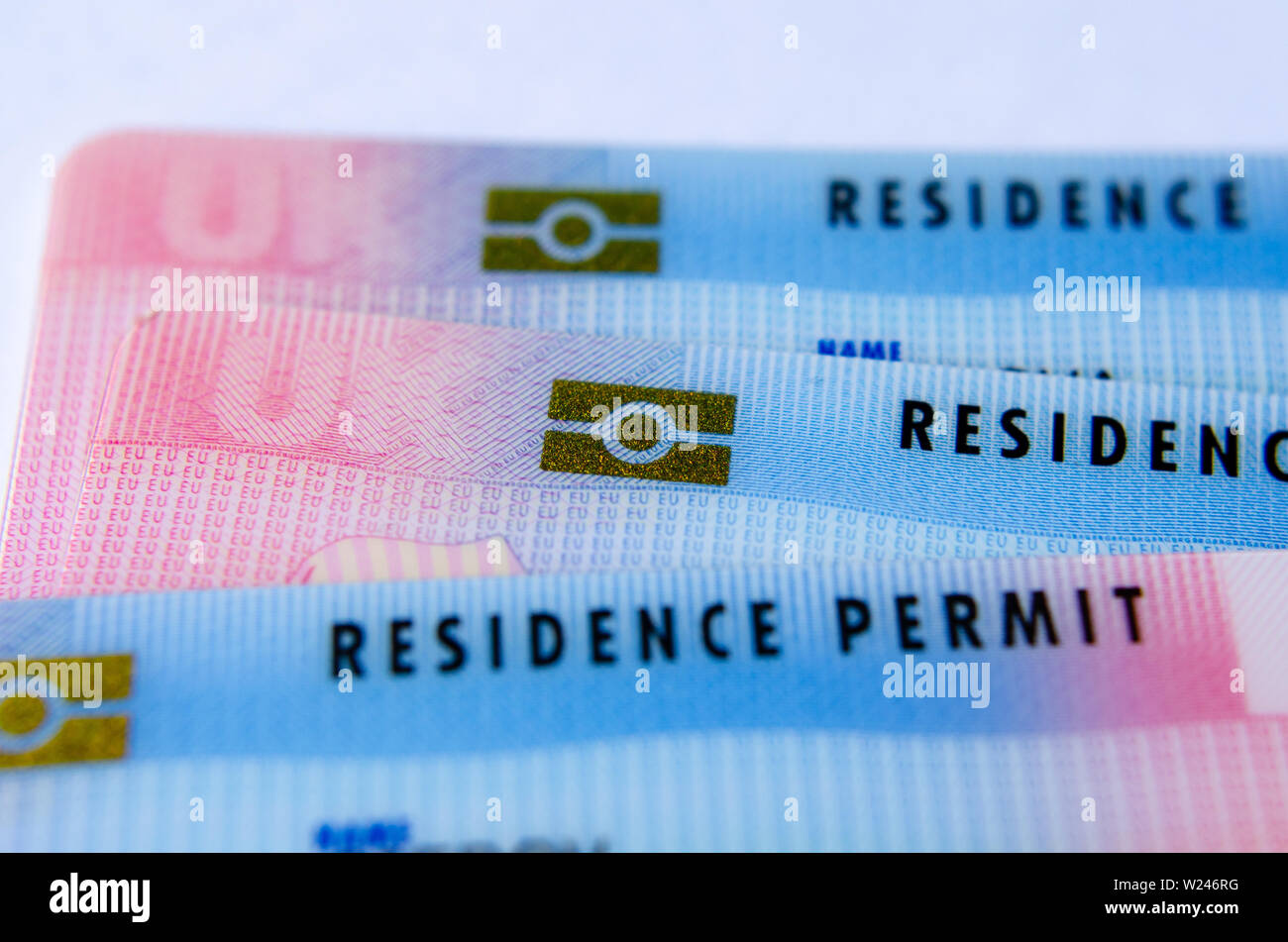 UK Tier 2 Visa BRP (Biometrical Residence Permit) cards - macro photo. Stock Photo