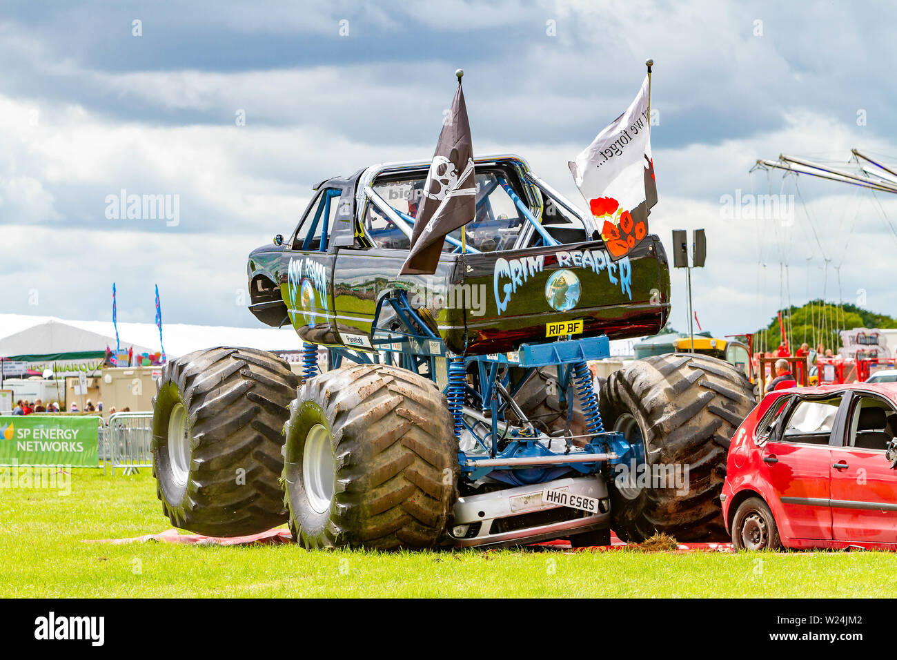 18 & 19 June 2019 - Royal Cheshire County Show - Big Pete and The Grim  Reaper monster trucks - The Grim Reaper gets stuck on a car Stock Photo -  Alamy