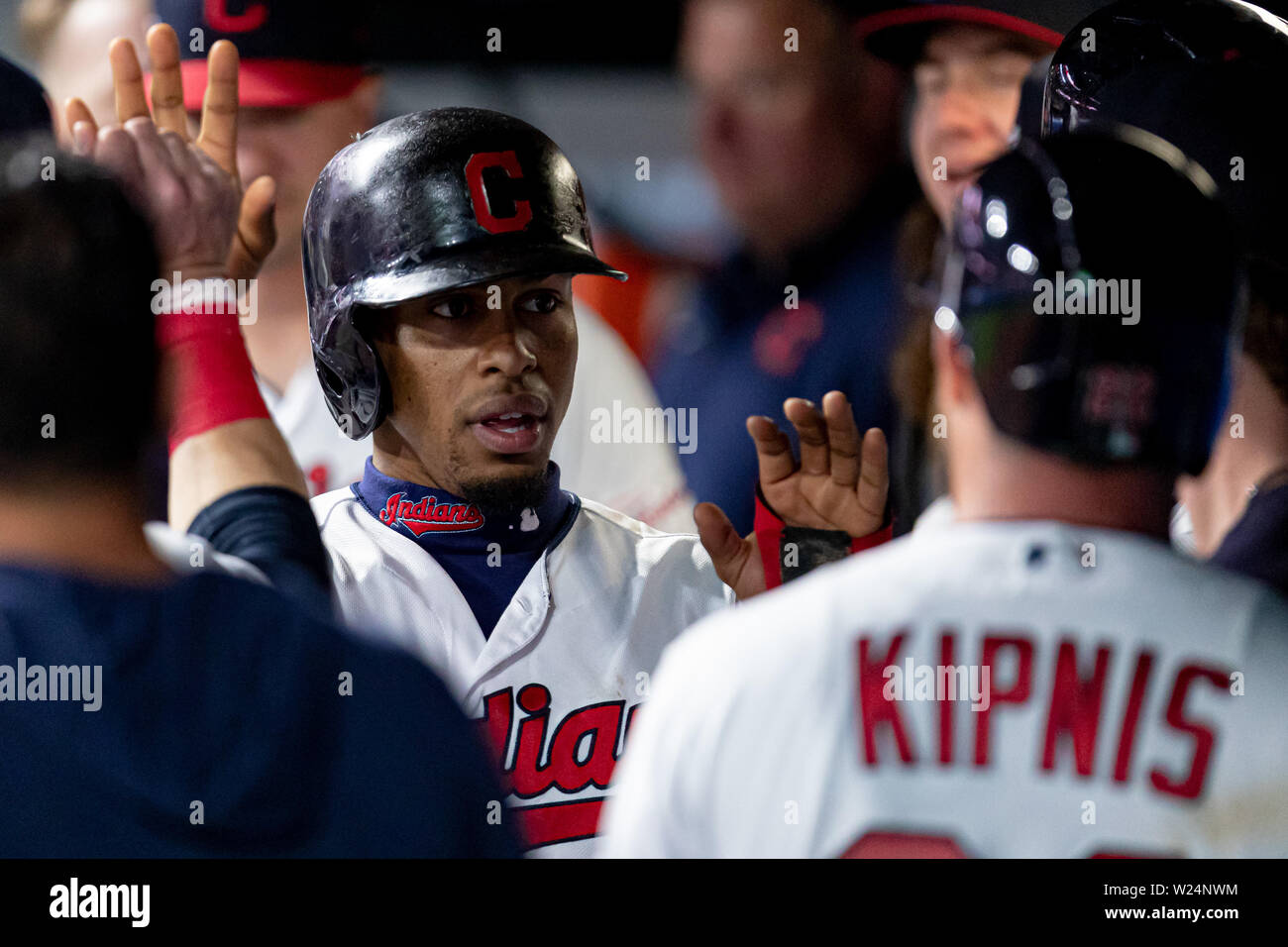 Rajai Davis and Francisco Lindor by Ron Schwane