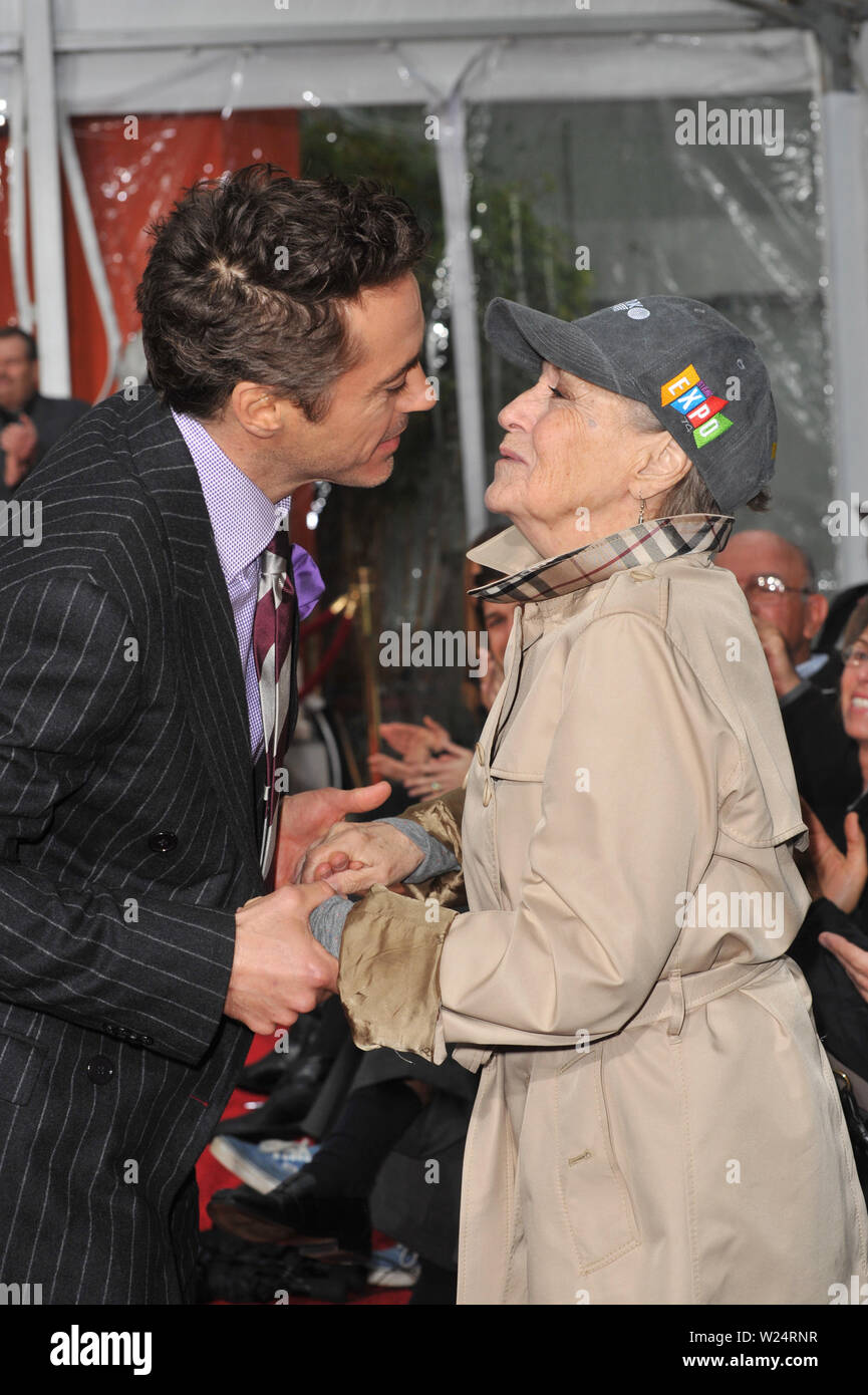 LOS ANGELES, CA. December 07, 2009: Actor Robert Downey Jr. & his mother Elise Downey at Grauman's Chinese Theatre where he was honored by having his hand & footprints set in cement in the 200th ceremony in the forecourt of the famous Hollywood landmark. © 2009 Paul Smith / Featureflash Stock Photo
