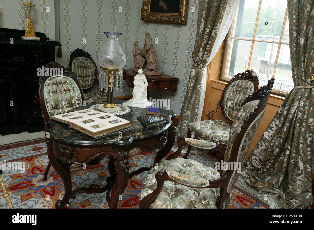A Photo Album Open On The Table In The Parlor Of The Taft