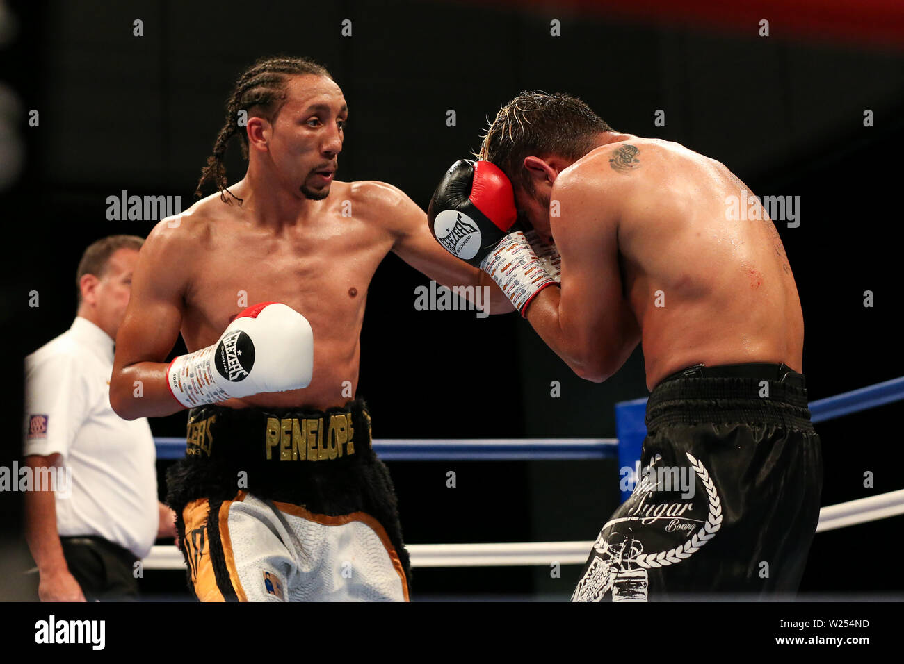 Tyrone Nurse lands a left hook on Oscar Amador during the Dennis Hobson Promotions boxing event at Ponds Forge, Sheffield. Picture date: 5th July 2019 Stock Photo