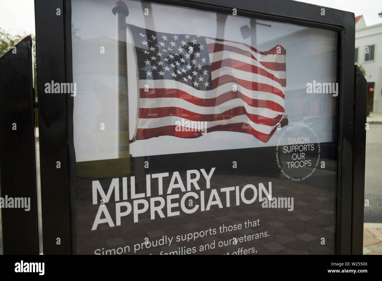 military appreciation and us flag poster with offers for veterans at St Johns Town Center Jacksonville Florida USA Stock Photo