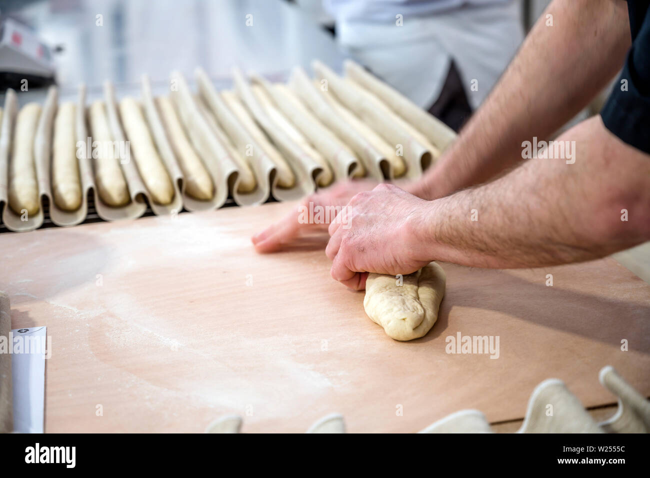The production of French baguettes is a bakers art. You need to knead