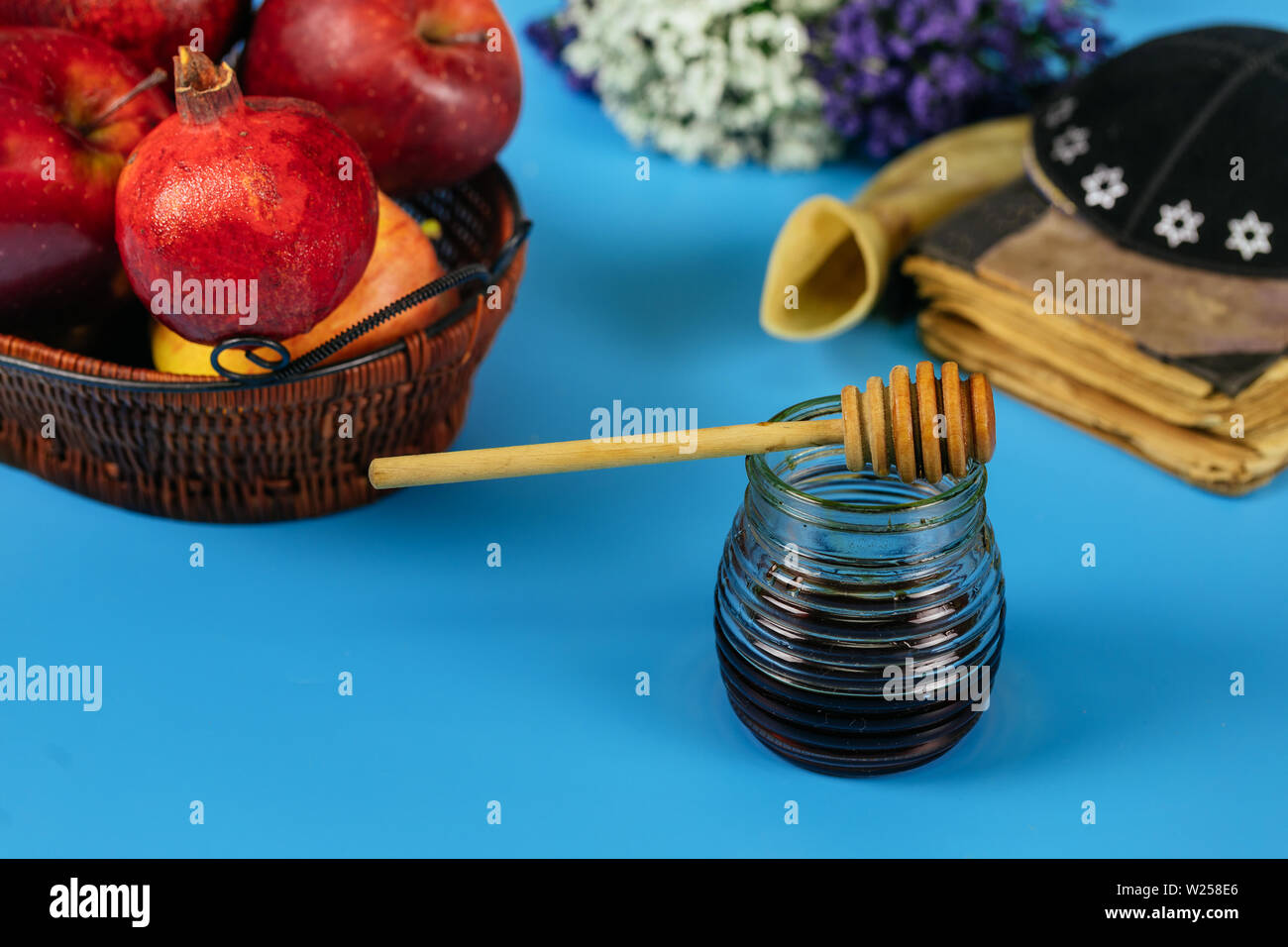 Apples, pomegranate and honey for Rosh Hashanah jewish holiday torah