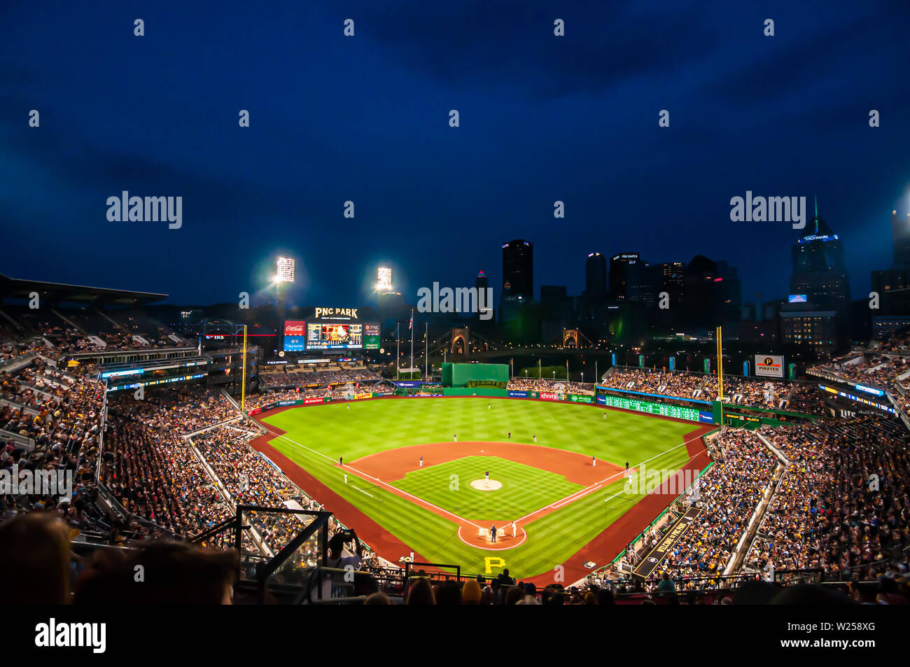 PNC Park, home field to the Pirates playing the Milwaukee Brewers on a  summer night with the stadium light on Stock Photo - Alamy