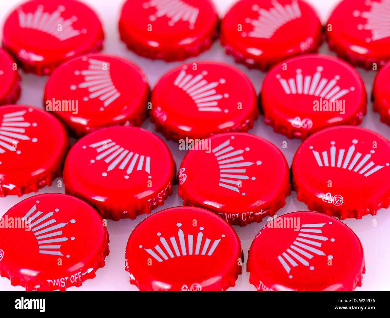 Kamchatka, Russia - 19 May 2018: Red beer caps Bud. From Anheuser-Busch ...
