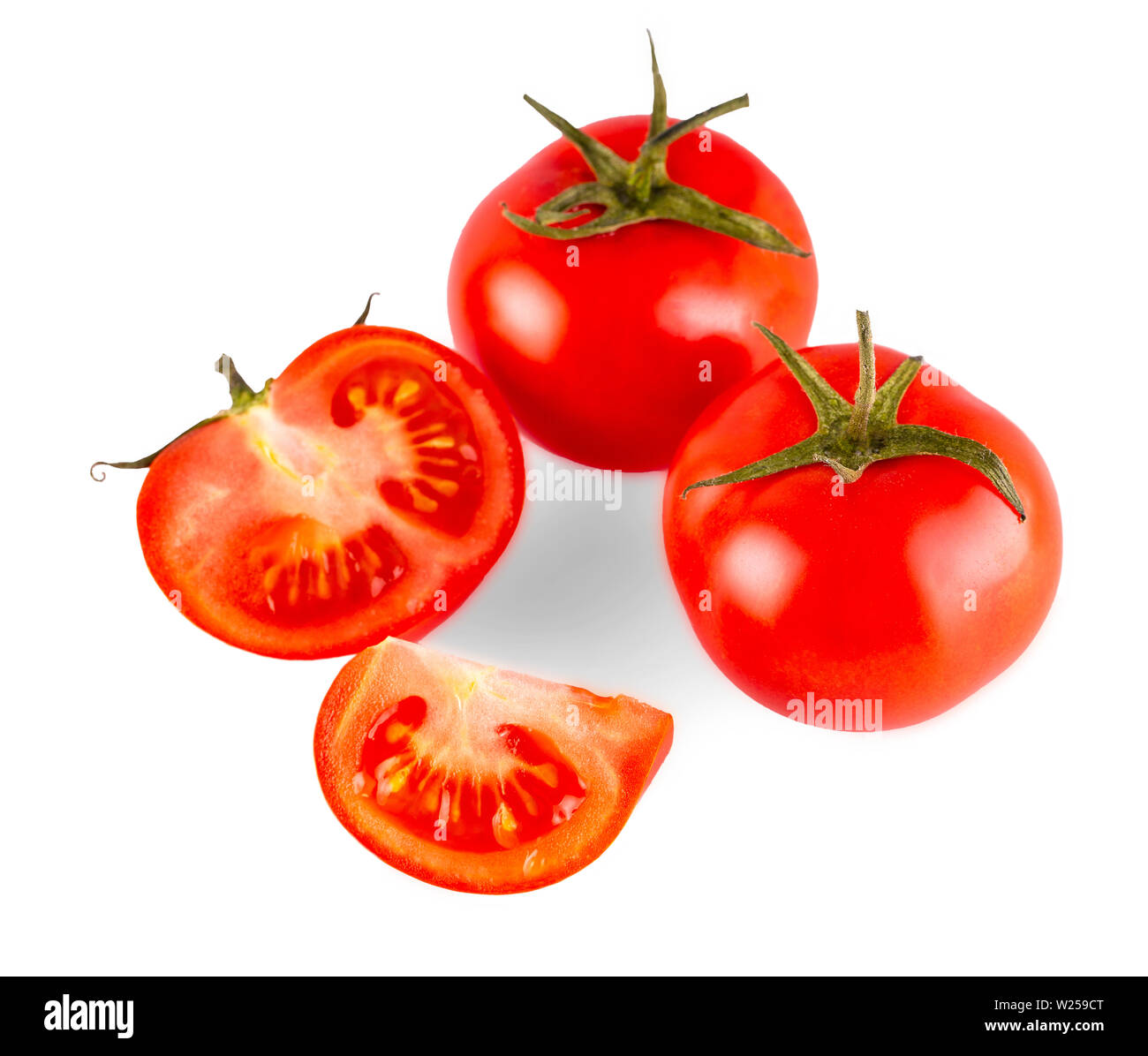 red tasty fresh tomatos on the white background Stock Photo - Alamy