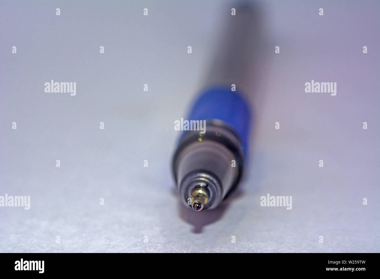 Tip of a blue ball point pen isolated from white background Stock Photo ...
