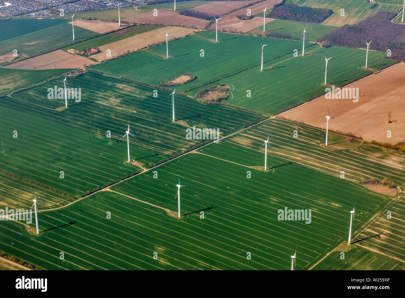 Aerial view over wind mill turbine farm close to Berlin, Germany. Stock Photo