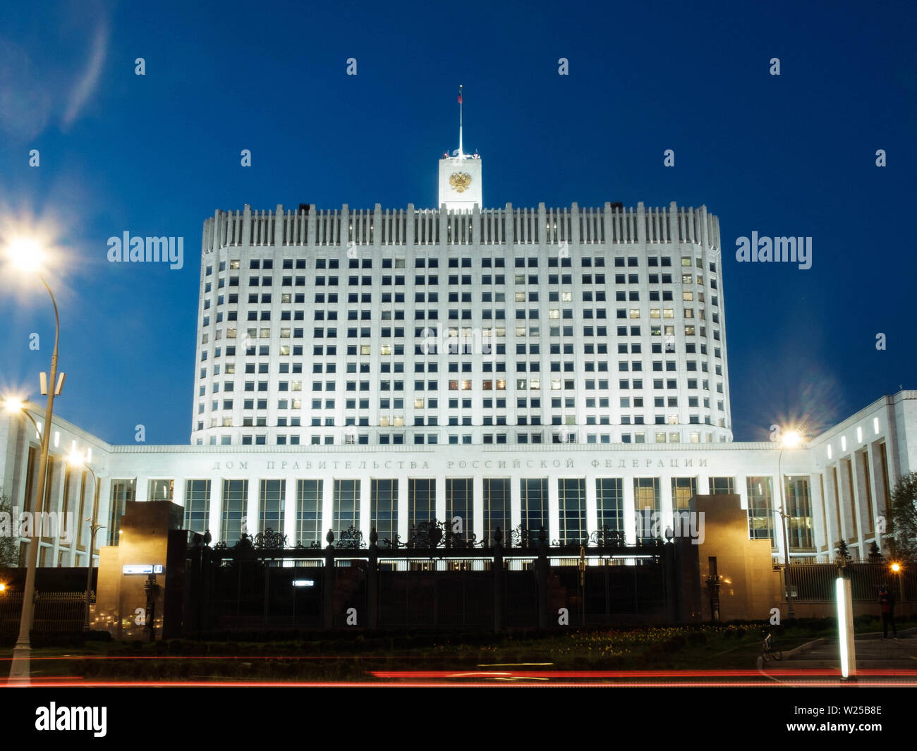Moscow, Russia - 30 April 2019. The facade of The House of the Government of the Russian Federation in the evening. Long exposure shot Stock Photo