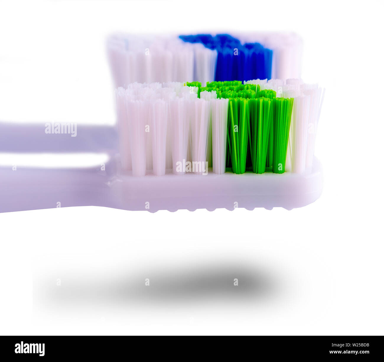 two toothbrushes with shadow isolated on white background Stock Photo ...