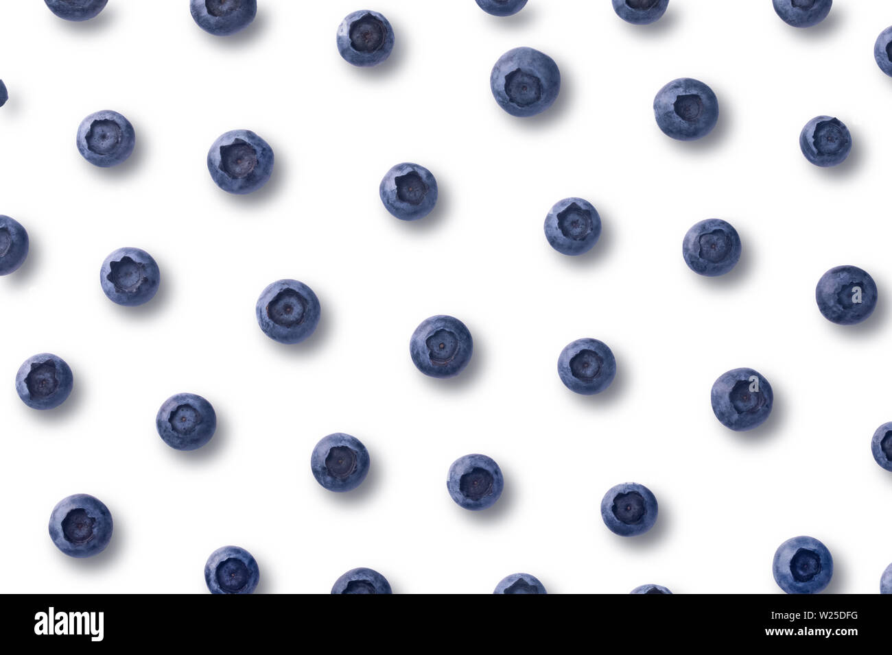 Flatlay pattern with fresh ripe blueberries isolated on white background Stock Photo