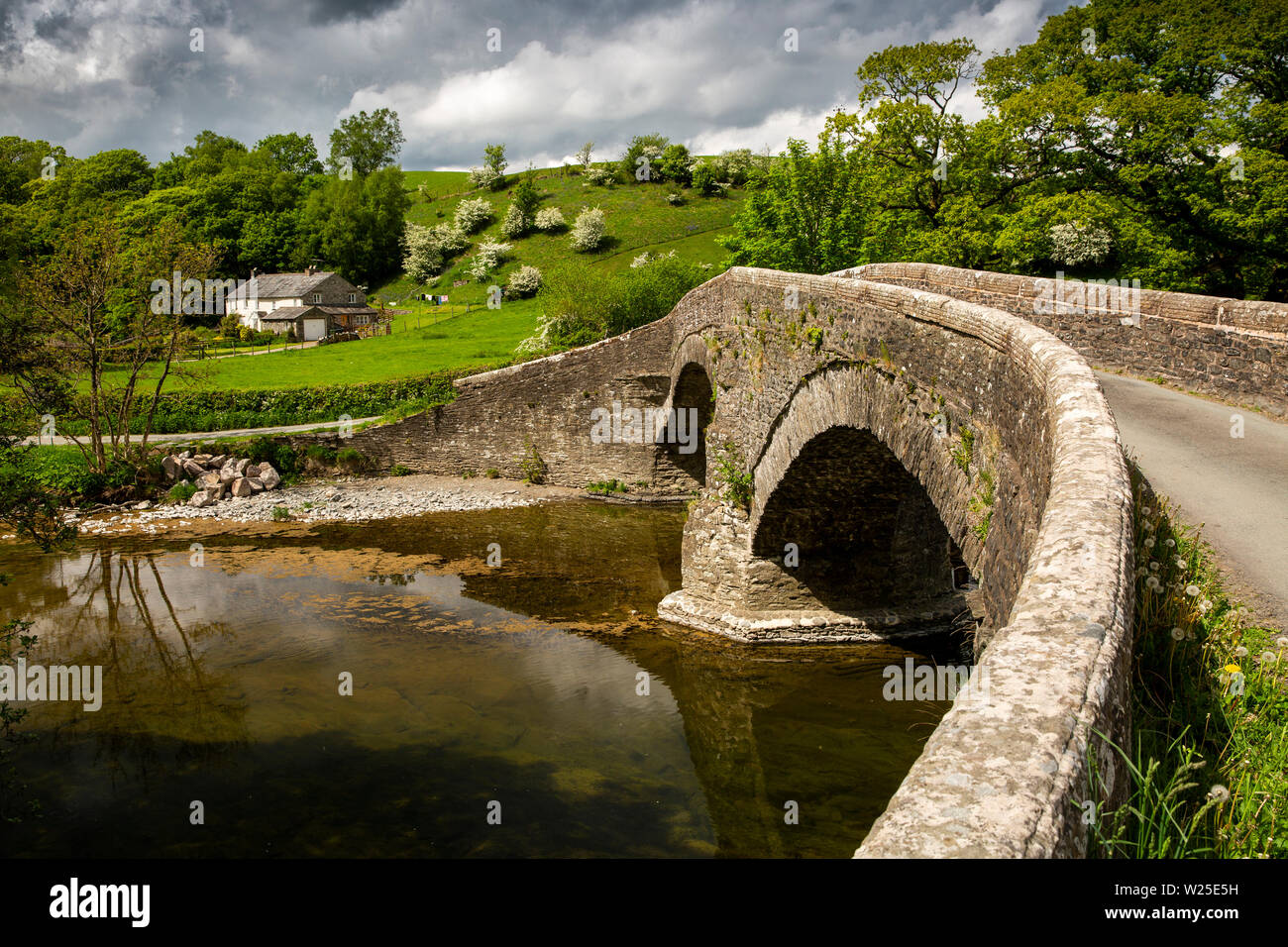 UK, Cumbria, Sedbergh, Lowgill, Crook of Lune, Pool House, isolated cottage at bridge over River Lune Stock Photo