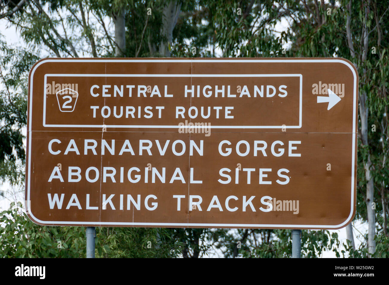 A tourist road sign in the Carnarvon National Park in the Central Highlands of Queensland in Australia. Stock Photo